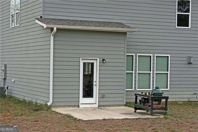 131 Queens Cemetery Rd, Good Hope, GA 30641 - back of property with a patio area