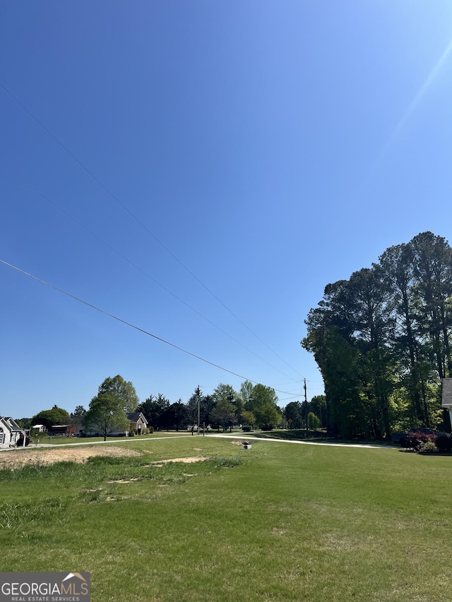 131 Queens Cemetery Rd, Good Hope, GA 30641 - view of green lawn