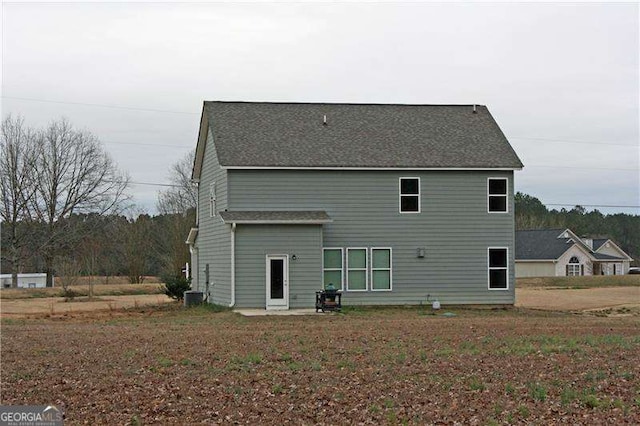 131 Queens Cemetery Rd, Good Hope, GA 30641 - rear view of property with a shingled roof and central AC unit