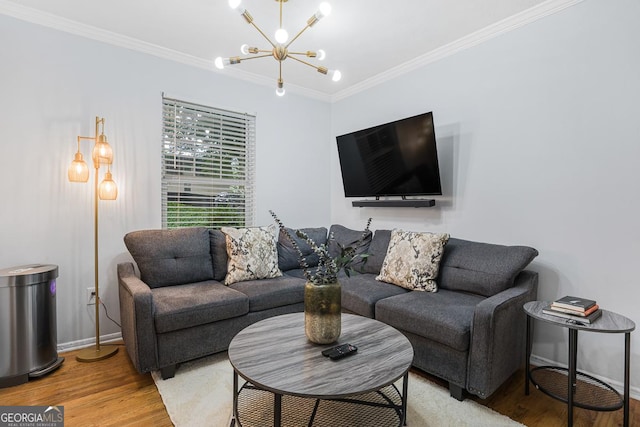 1150 Collier Rd NW Unit 25D, Atlanta, GA 30318 - living area featuring wood finished floors, a chandelier, baseboards, and ornamental molding