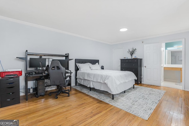 1150 Collier Rd NW Unit 25D, Atlanta, GA 30318 - bedroom with crown molding, hardwood / wood-style flooring, an office area, recessed lighting, and baseboards