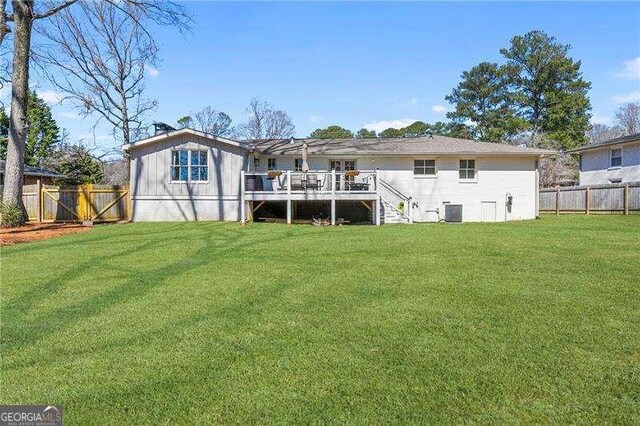 back of property with a deck, stairway, central air condition unit, and a pergola