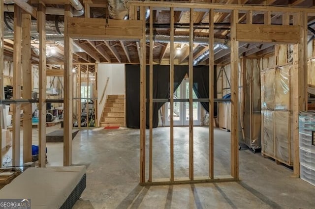 143 Treadstone Ln, Dallas, GA 30132 - miscellaneous room with concrete flooring and stairway