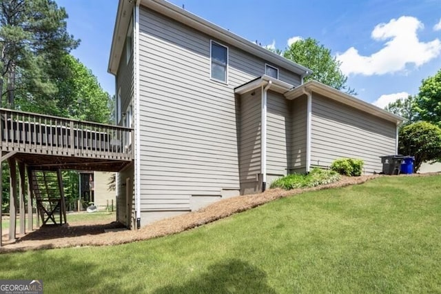 143 Treadstone Ln, Dallas, GA 30132 - view of home's exterior featuring a wooden deck and a yard