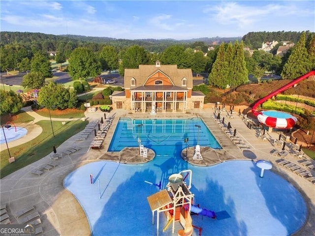 143 Treadstone Ln, Dallas, GA 30132 - community pool with a wooded view