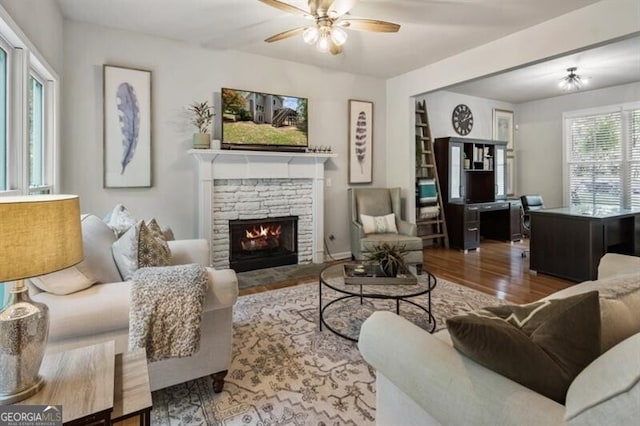 143 Treadstone Ln, Dallas, GA 30132 - living room with ceiling fan, wood finished floors, and a fireplace