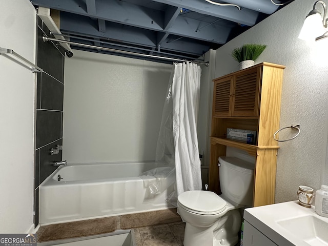 2059 Clearwater Dr SE, Marietta, GA 30067 - bathroom featuring toilet, shower / bath combination with curtain, and a textured wall