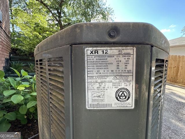 2059 Clearwater Dr SE, Marietta, GA 30067 - exterior view of fence and central air condition unit