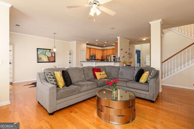5888 Cobblestone Creek Cir, Mableton, GA 30126 - living area with baseboards, a ceiling fan, stairs, light wood-style flooring, and recessed lighting