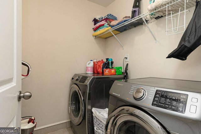 5888 Cobblestone Creek Cir, Mableton, GA 30126 - laundry area featuring washing machine and dryer, baseboards, and tile patterned floors