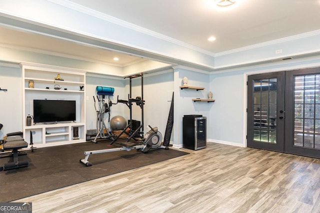 5888 Cobblestone Creek Cir, Mableton, GA 30126 - workout area featuring french doors, wood finished floors, ornamental molding, and baseboards
