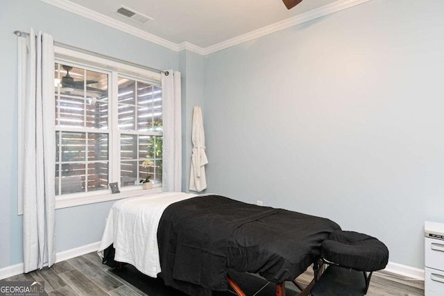 5888 Cobblestone Creek Cir, Mableton, GA 30126 - bedroom with wood finished floors, baseboards, and ornamental molding