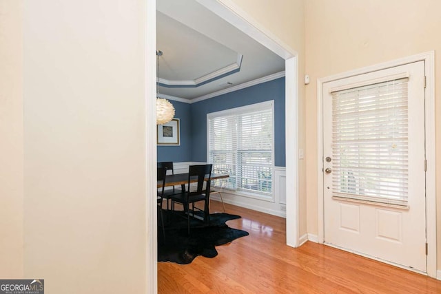 5888 Cobblestone Creek Cir, Mableton, GA 30126 - entrance foyer with wood finished floors, crown molding, and wainscoting