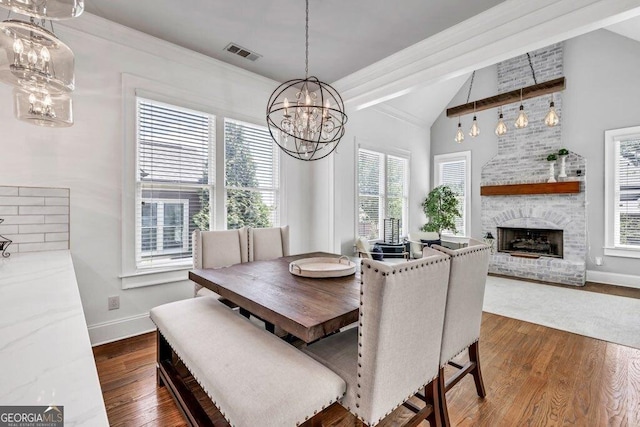 5461 Autumn Flame Dr, Braselton, GA 30517 - dining area with a chandelier, baseboards, dark wood finished floors, and plenty of natural light