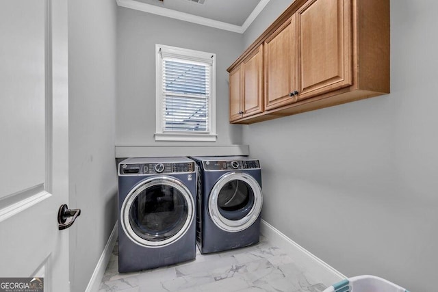 5461 Autumn Flame Dr, Braselton, GA 30517 - washroom with washer and dryer, marble look tile flooring, crown molding, baseboards, and cabinet space