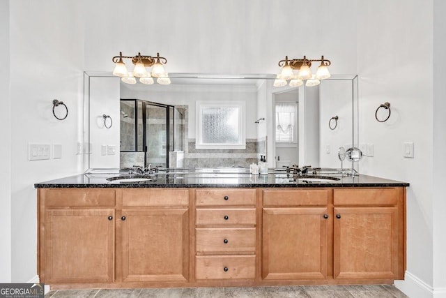 5461 Autumn Flame Dr, Braselton, GA 30517 - full bathroom featuring double vanity, a shower stall, and a chandelier
