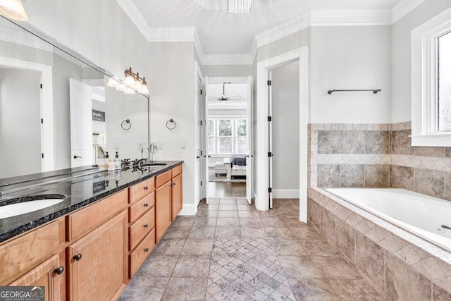 5461 Autumn Flame Dr, Braselton, GA 30517 - ensuite bathroom featuring double vanity, a garden tub, a ceiling fan, crown molding, and baseboards