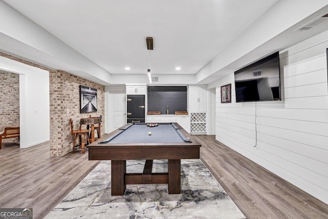 5461 Autumn Flame Dr, Braselton, GA 30517 - game room featuring wood finished floors, billiards, brick wall, and a sink