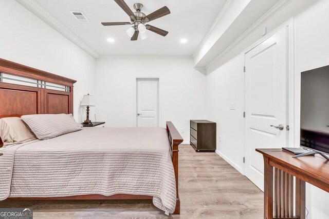 5461 Autumn Flame Dr, Braselton, GA 30517 - bedroom featuring crown molding, light wood finished floors, recessed lighting, a ceiling fan, and baseboards