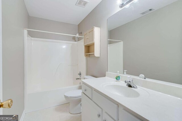 bathroom with toilet, shower / tub combination, and vanity