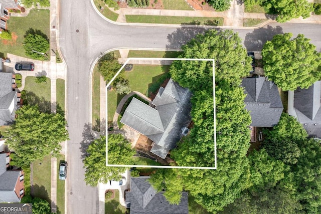 aerial view of residential area with property parcel outlined