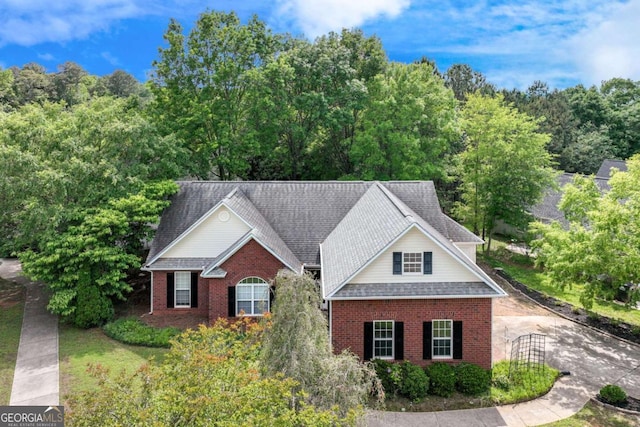 traditional-style house with brick siding