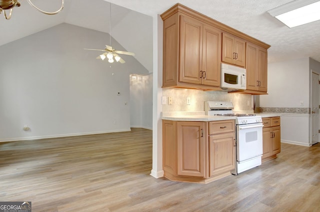 323 Newfield Way, Peachtree City, GA 30269 - kitchen with white appliances, a ceiling fan, light countertops, light wood-type flooring, and baseboards