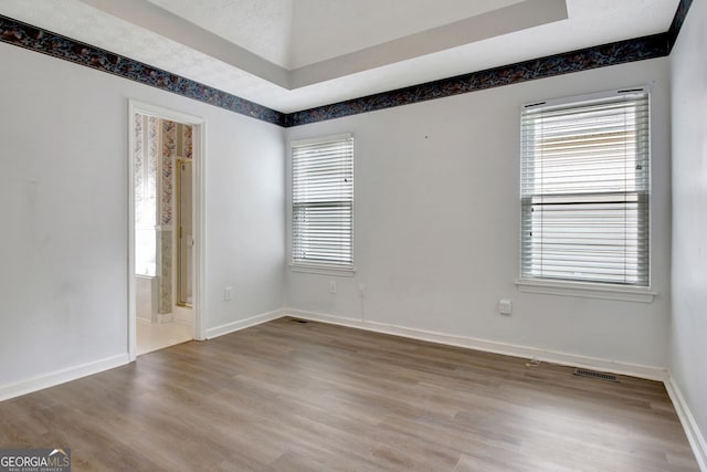 323 Newfield Way, Peachtree City, GA 30269 - spare room featuring wood finished floors and baseboards