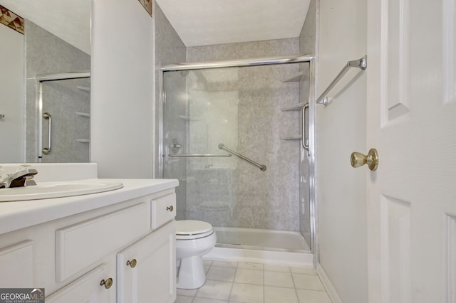 323 Newfield Way, Peachtree City, GA 30269 - full bathroom with toilet, a stall shower, vanity, and tile patterned floors