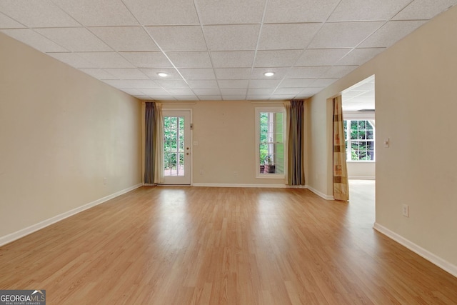 323 Newfield Way, Peachtree City, GA 30269 - unfurnished living room featuring a drop ceiling, light wood finished floors, baseboards, and recessed lighting
