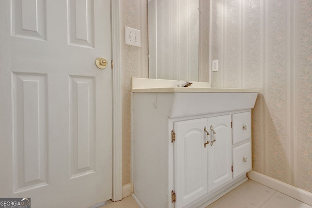323 Newfield Way, Peachtree City, GA 30269 - bathroom with wallpapered walls, vanity, and baseboards