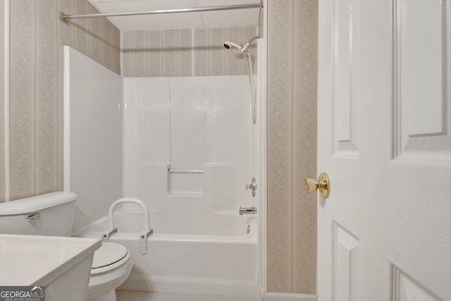 323 Newfield Way, Peachtree City, GA 30269 - bathroom featuring wallpapered walls, toilet, shower / bath combination, and vanity