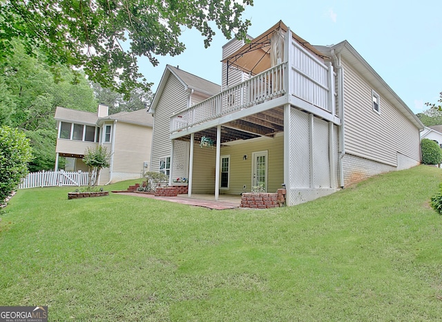 323 Newfield Way, Peachtree City, GA 30269 - rear view of house featuring a deck and a patio
