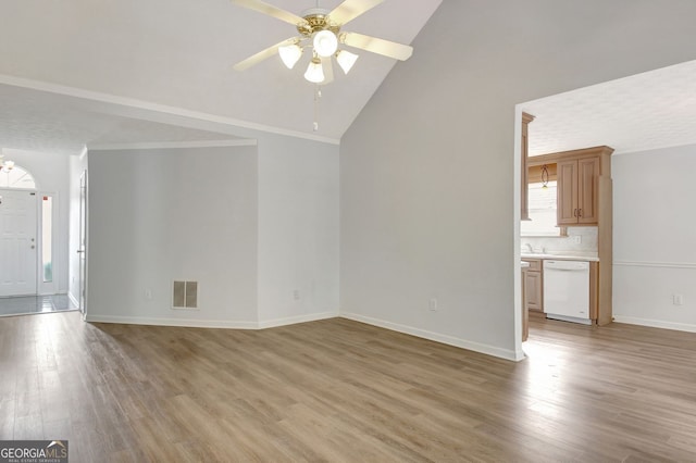 323 Newfield Way, Peachtree City, GA 30269 - unfurnished living room featuring light wood finished floors, a ceiling fan, baseboards, and high vaulted ceiling