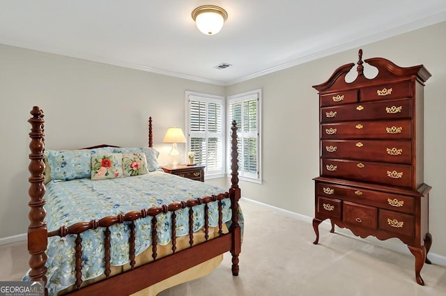 carpeted bedroom with baseboards and ornamental molding