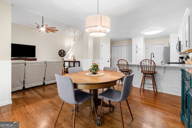 164 Stoneforest Dr, Woodstock, GA 30189 - dining area featuring a ceiling fan and wood finished floors