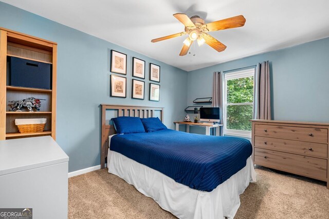 164 Stoneforest Dr, Woodstock, GA 30189 - carpeted bedroom with a ceiling fan and baseboards