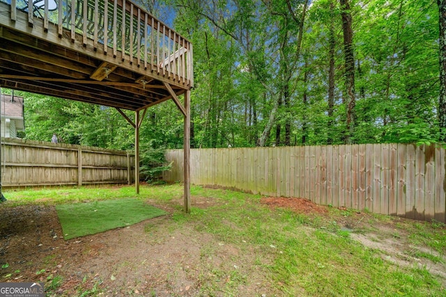 164 Stoneforest Dr, Woodstock, GA 30189 - fenced backyard featuring a deck