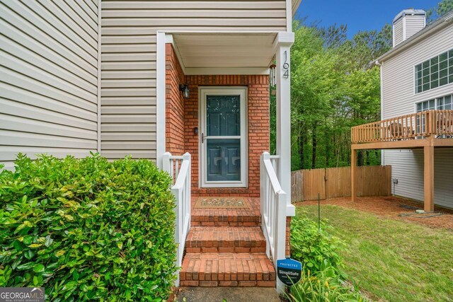 164 Stoneforest Dr, Woodstock, GA 30189 - property entrance featuring brick siding