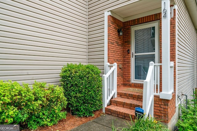 164 Stoneforest Dr, Woodstock, GA 30189 - view of exterior entry featuring brick siding