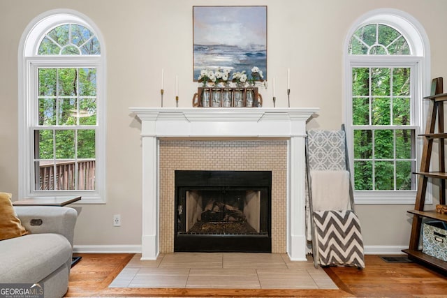 164 Stoneforest Dr, Woodstock, GA 30189 - detailed view of a fireplace and wood finished floors