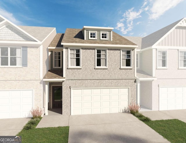 townhome / multi-family property with an attached garage, driveway, and brick siding