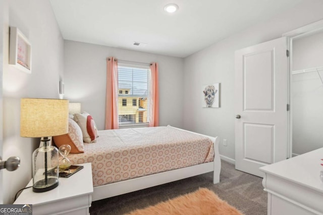 bedroom featuring carpet floors, baseboards, and recessed lighting