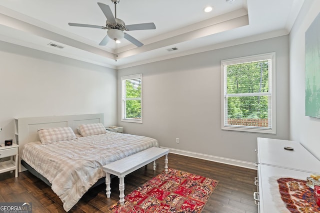 3219 Blackshear Dr, Marietta, GA 30060 - bedroom with a tray ceiling, baseboards, dark wood-type flooring, recessed lighting, and crown molding