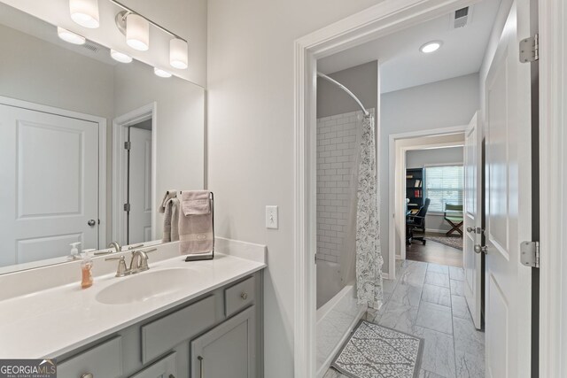 3219 Blackshear Dr, Marietta, GA 30060 - bathroom with marble finish flooring, vanity, shower / bath combo, and baseboards