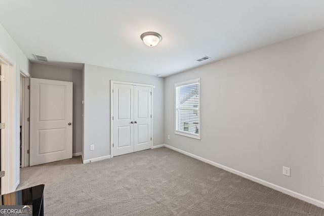 3219 Blackshear Dr, Marietta, GA 30060 - unfurnished bedroom with carpet, baseboards, and a closet
