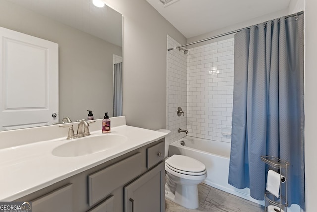 3219 Blackshear Dr, Marietta, GA 30060 - full bathroom with shower / tub combo, vanity, toilet, and marble finish floors