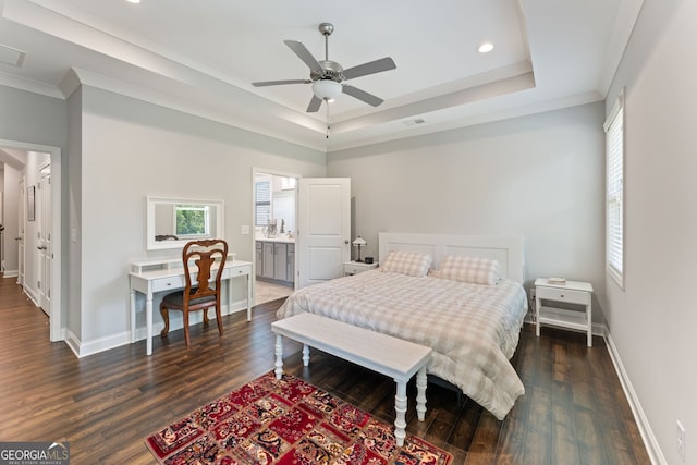 3219 Blackshear Dr, Marietta, GA 30060 - bedroom featuring multiple windows, a tray ceiling, dark wood-style floors, baseboards, and ornamental molding