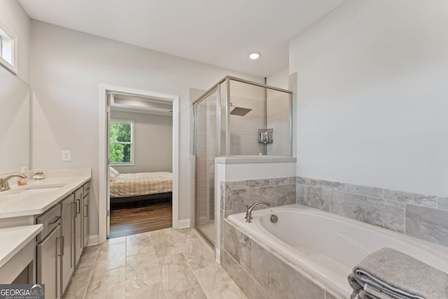 3219 Blackshear Dr, Marietta, GA 30060 - ensuite bathroom featuring vanity, a stall shower, a bath, marble finish floors, and recessed lighting