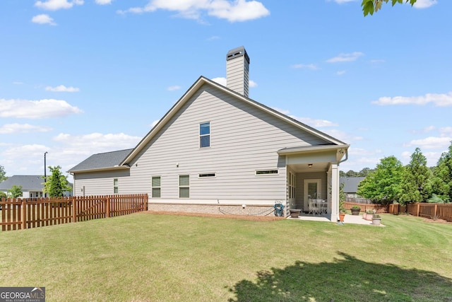 3219 Blackshear Dr, Marietta, GA 30060 - back of house featuring a patio and a chimney
